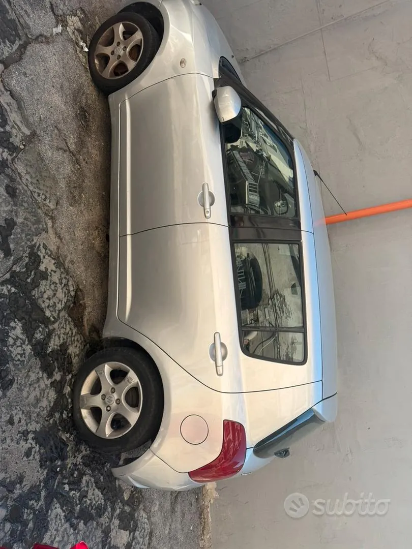 Suzuki Swift 2006 photo 2