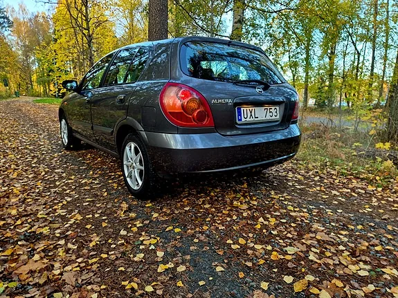 Nissan Almera 2004 photo 3