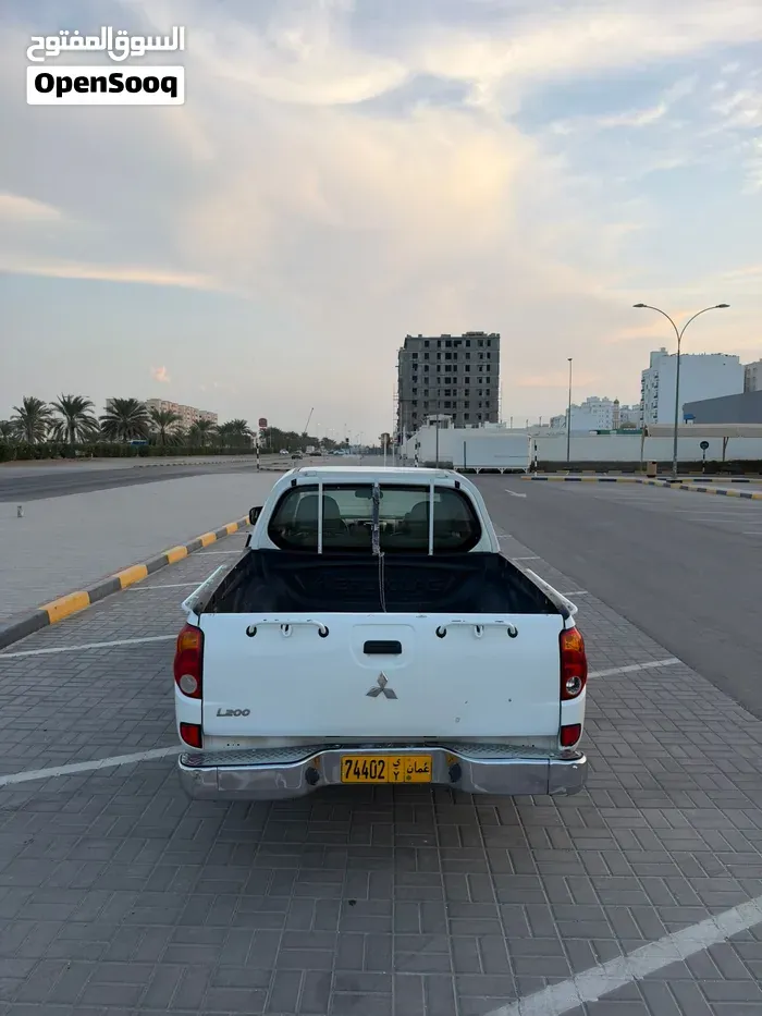 Mitsubishi L200 2011 photo 2
