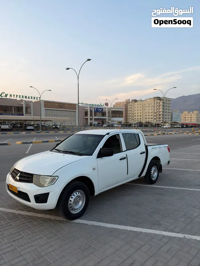 Mitsubishi L200 2011 photo 3