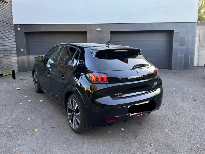 Peugeot E-208 2021 photo 3