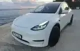 Tesla Model Y 2024 photo 2