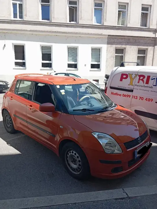 Suzuki Swift 2006 photo 2