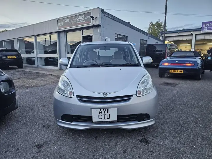 Perodua Myvi 2011 photo 3