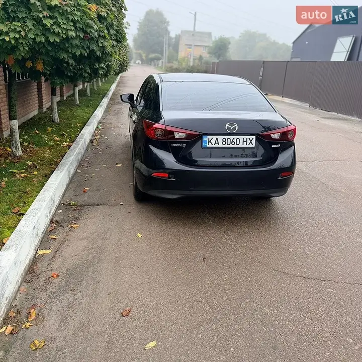 Mazda 3 2014 photo 3