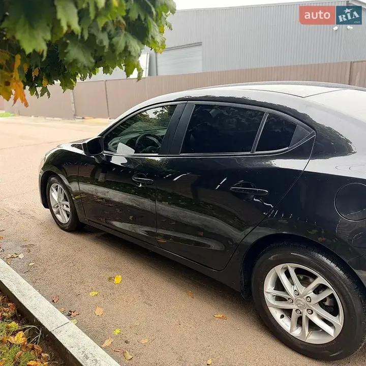 Mazda 3 2014 photo 4