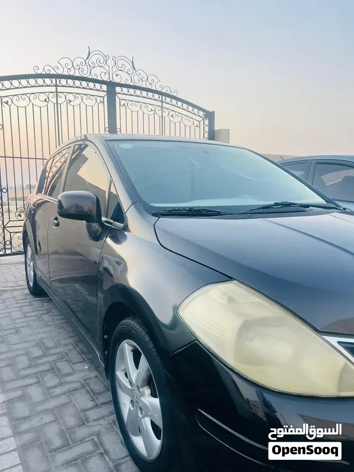 Nissan Tiida 2012 photo 2
