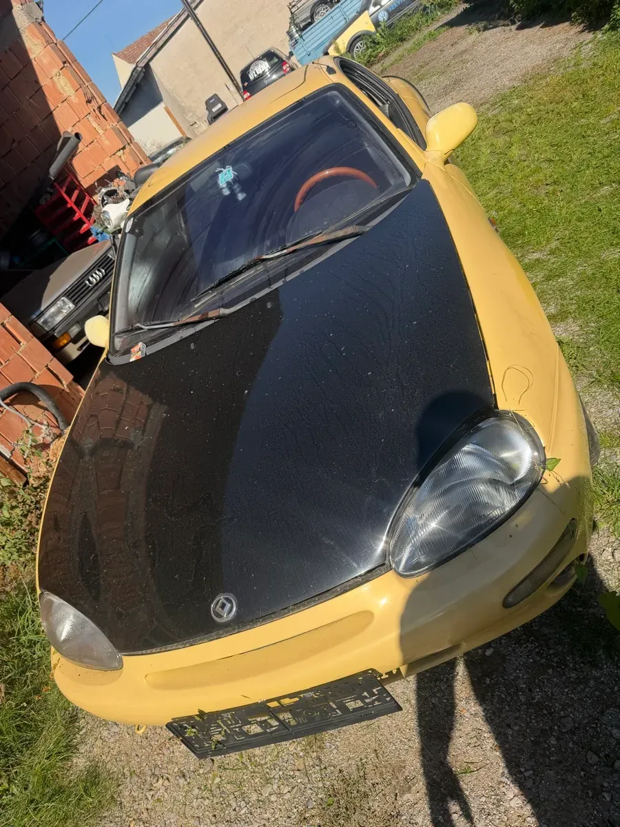 Mazda Mx-3 1999 photo 2