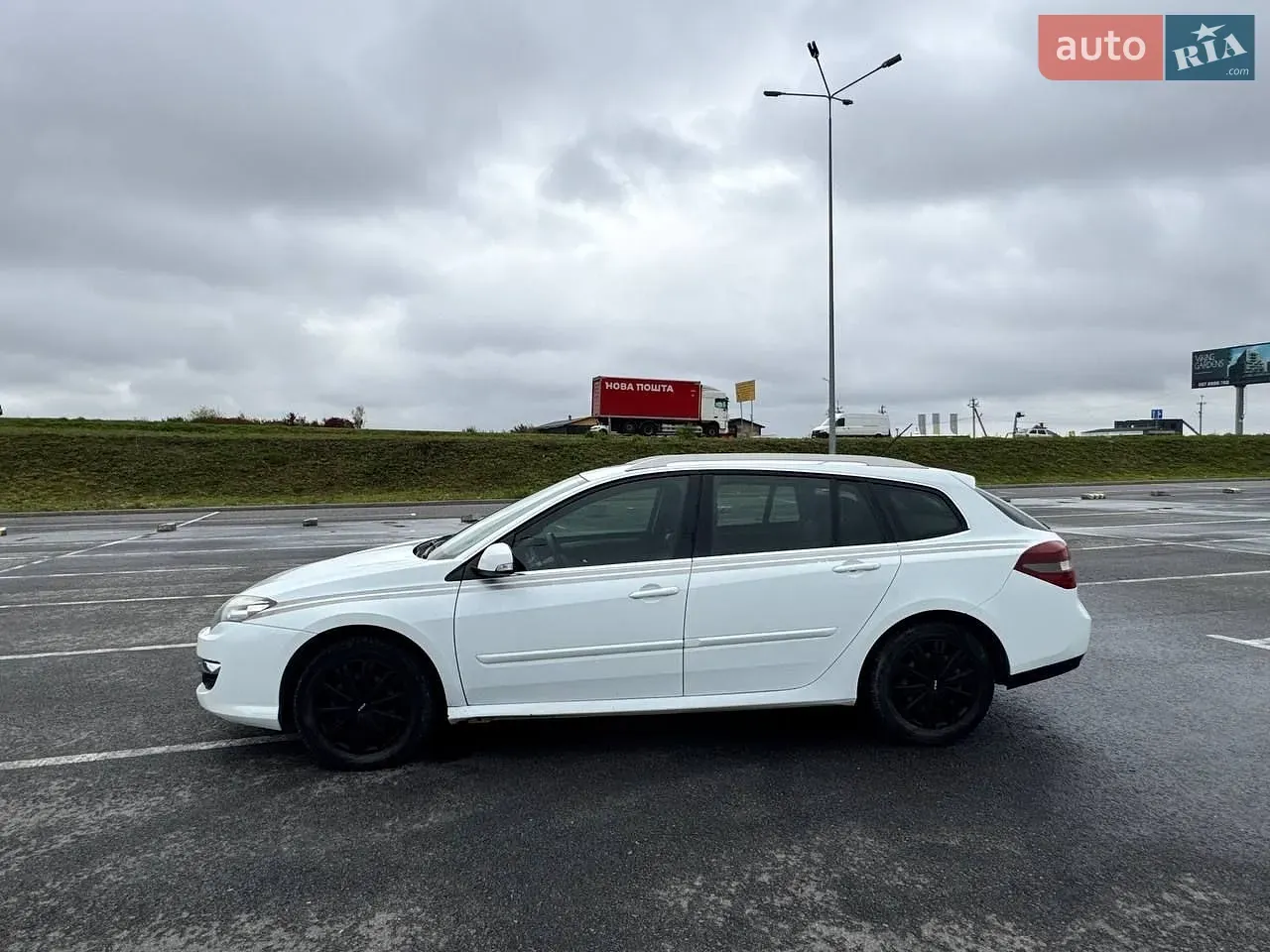 Renault Laguna 2010 photo 2