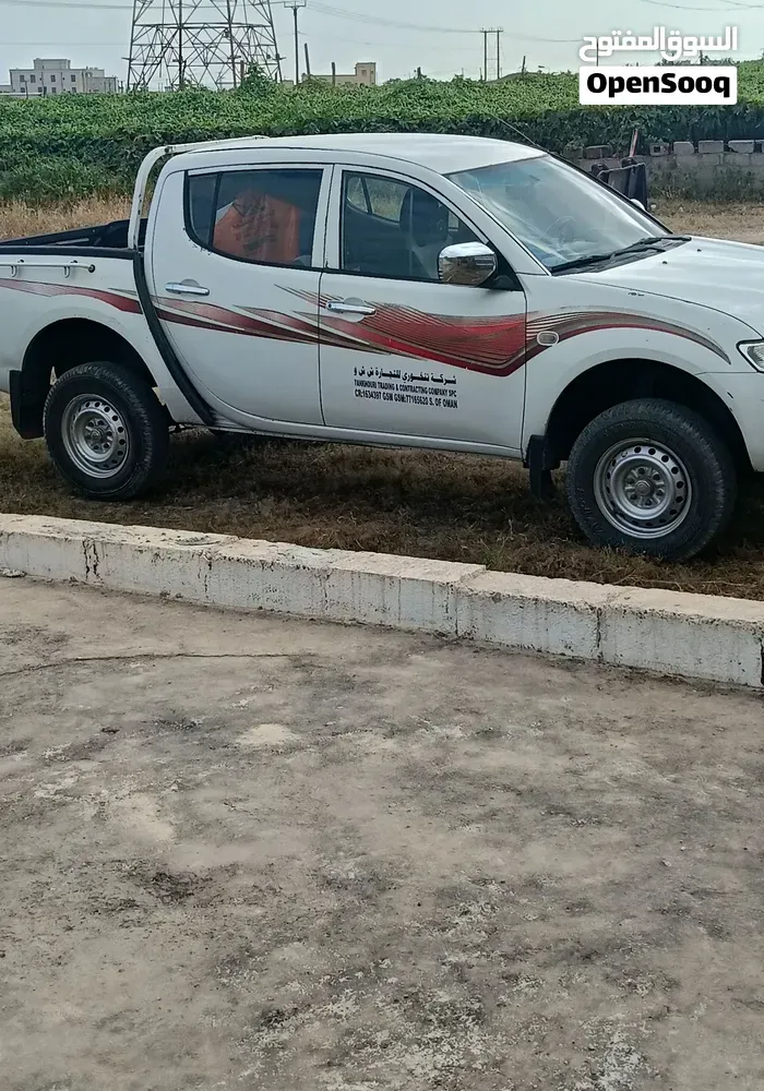 Mitsubishi L200 2011 photo 3