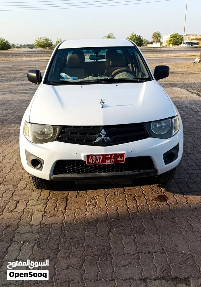 Mitsubishi L200 2011 photo 4