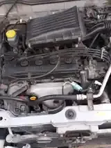 Nissan March 2001 photo 4