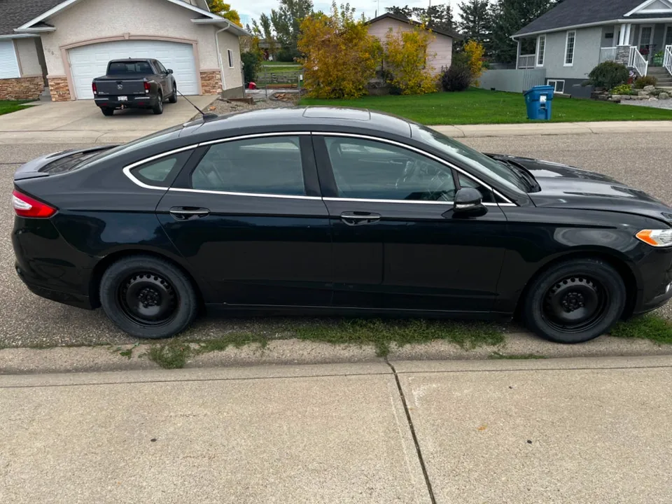 Ford Fusion 2014 photo 2