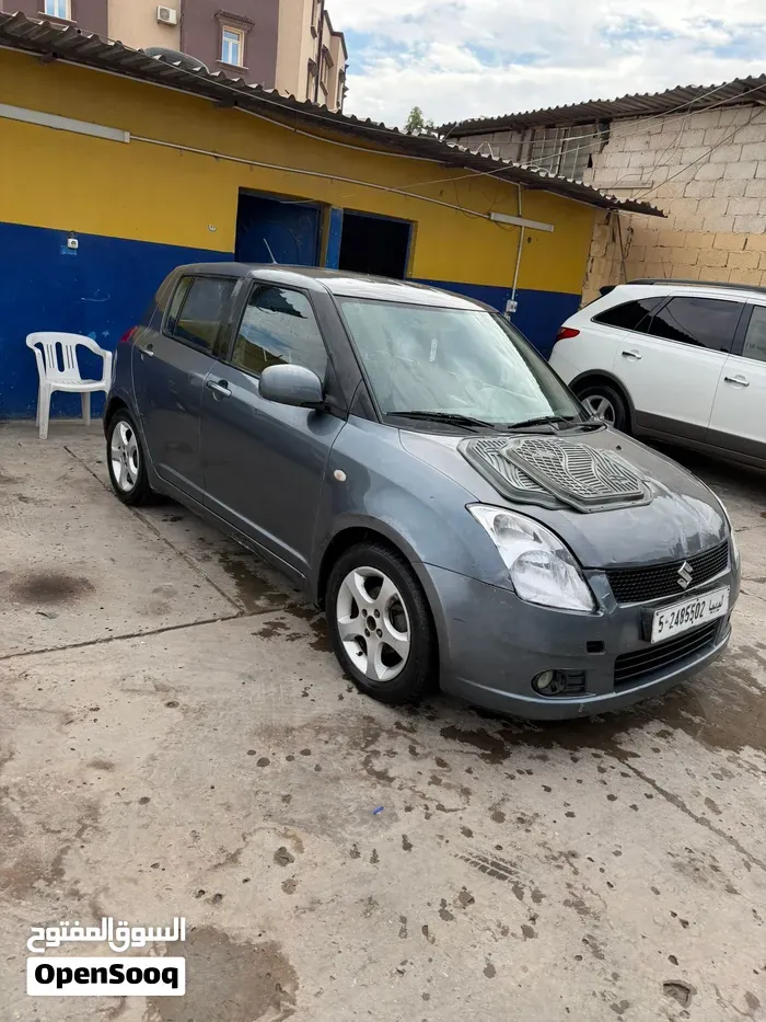 Suzuki Swift 2010 photo 2
