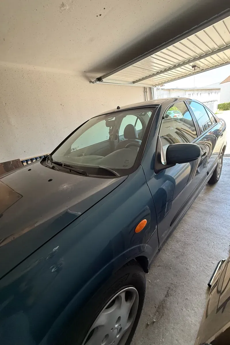 Nissan Almera 2002 photo 3