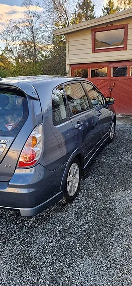 Suzuki Liana 2005 photo 5