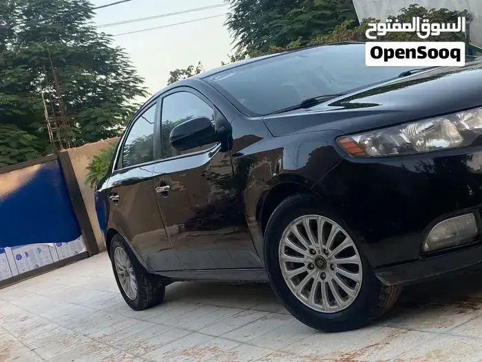 Kia Cerato 2012 photo 2