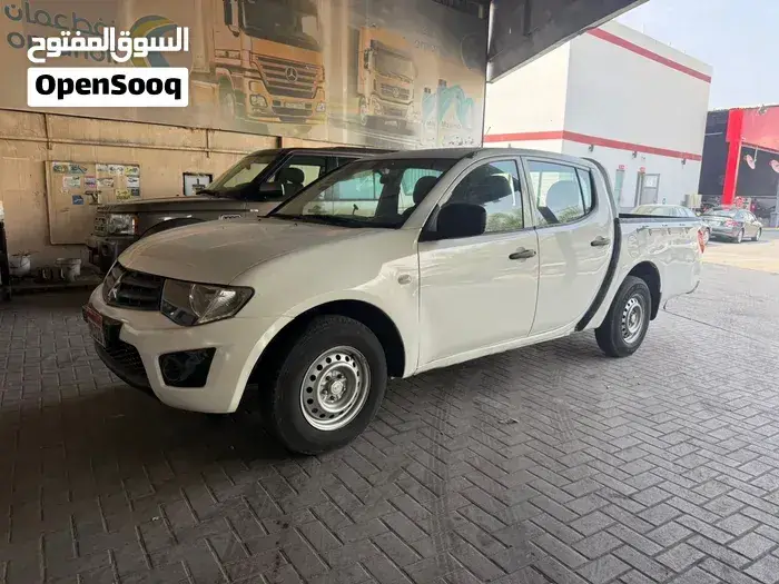 Mitsubishi L200 2012 photo 2