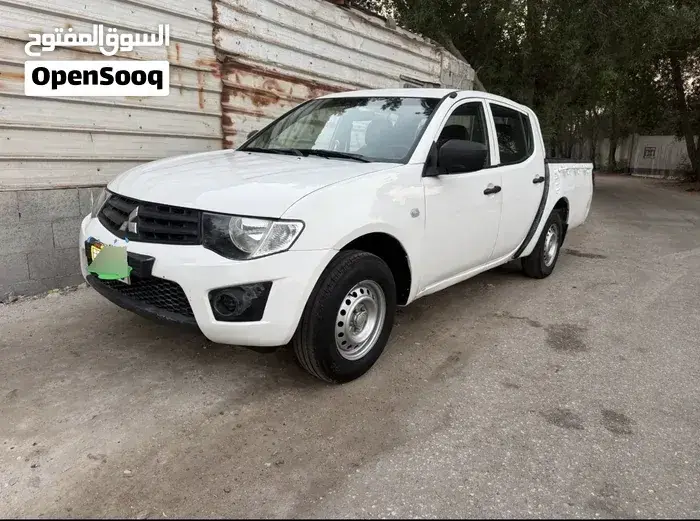 Mitsubishi L200 2012 photo 3