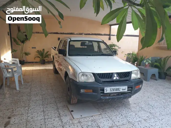 Mitsubishi L200 2006 photo 2