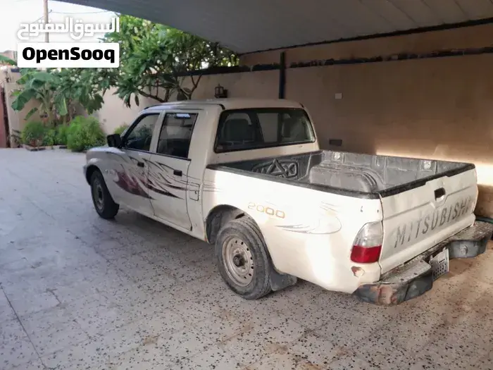 Mitsubishi L200 2006 photo 4