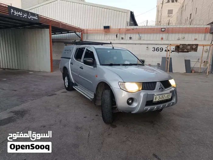 Mitsubishi L200 2009 photo 3