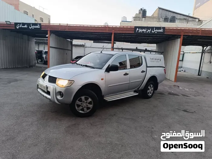 Mitsubishi L200 2009 photo 2