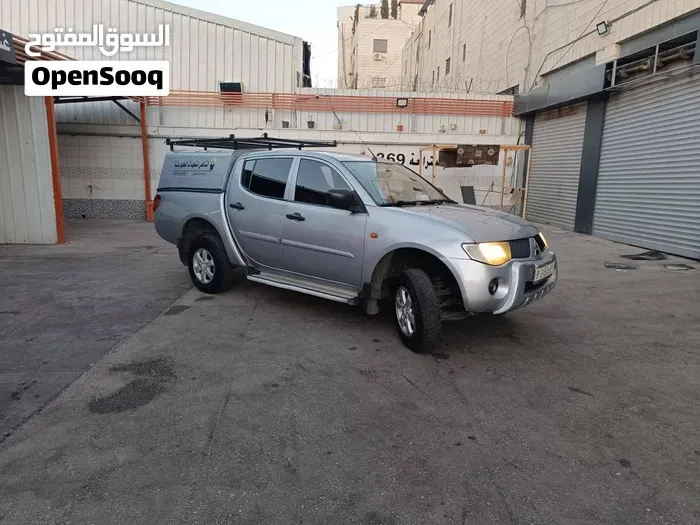 Mitsubishi L200 2009 photo 4