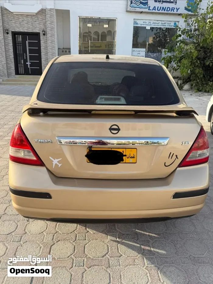 Nissan Tiida 2011 photo 2
