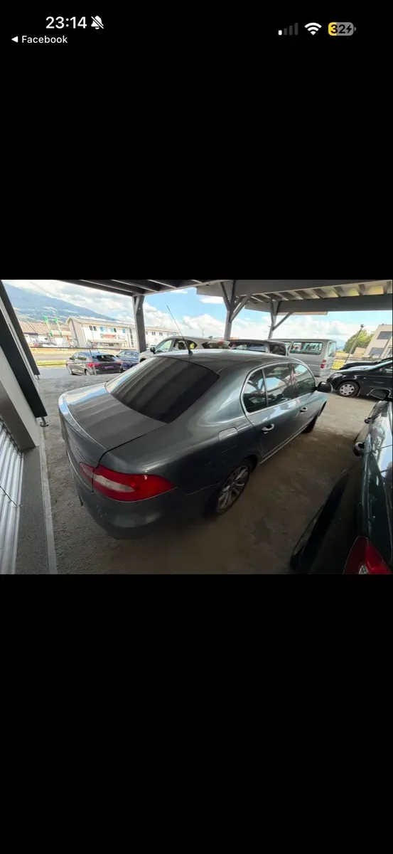 Skoda Superb 2009 photo 2