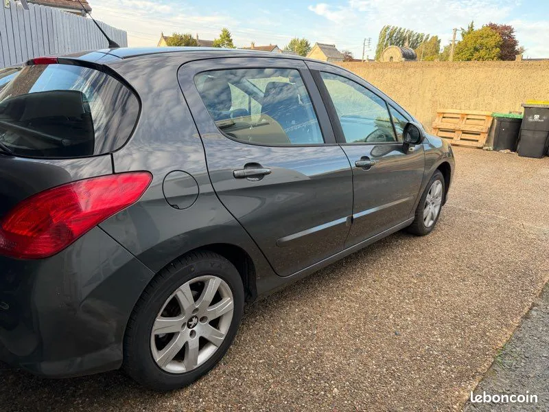 Peugeot 308 2011 photo 2