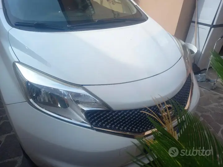 Nissan Note 2014 photo 4