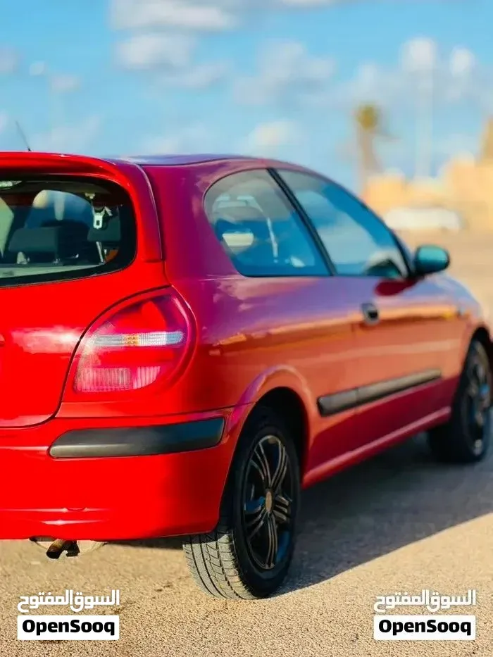 Nissan Almera 2000 photo 2