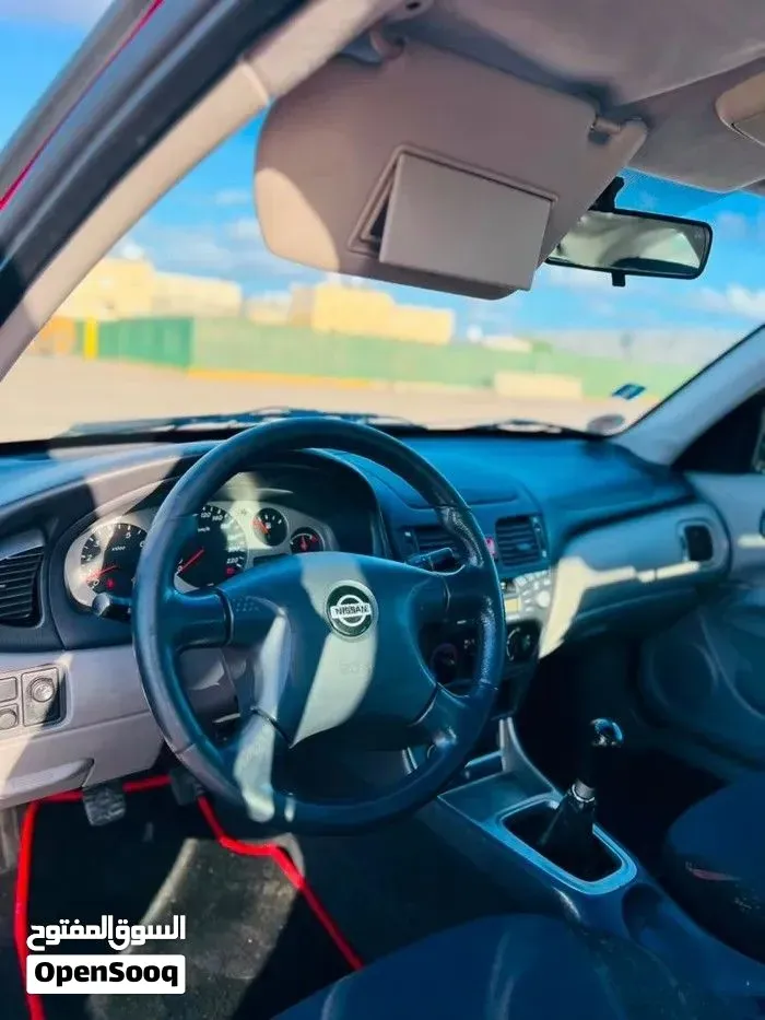 Nissan Almera 2000 photo 4
