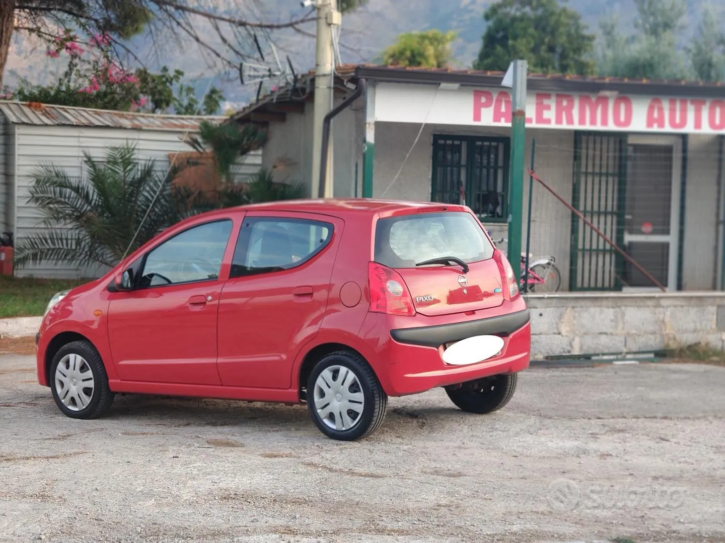 Nissan Pixo 2011 photo 2