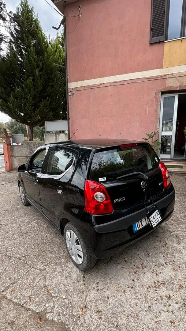 Nissan Pixo 2010 photo 3