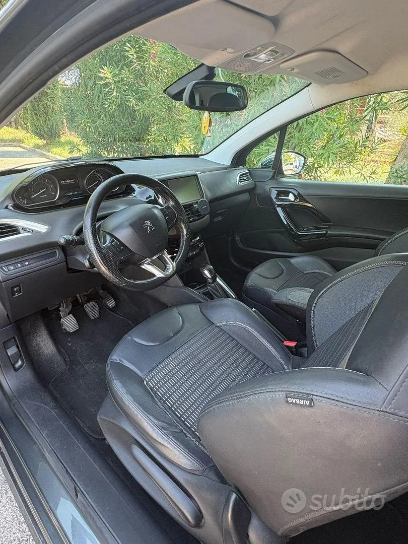 Peugeot 208 2013 photo 5