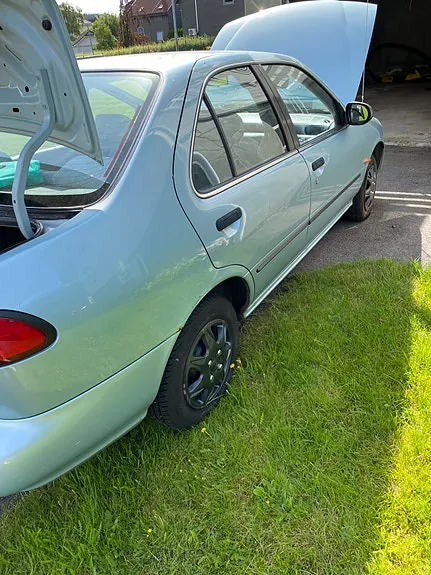 Nissan Almera 1996 photo 2