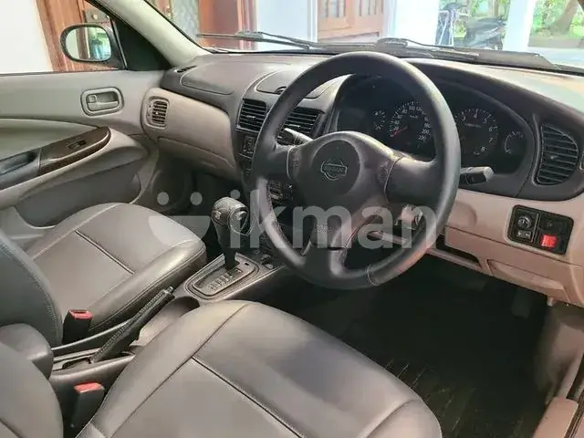 Nissan Sunny 2004 photo 4