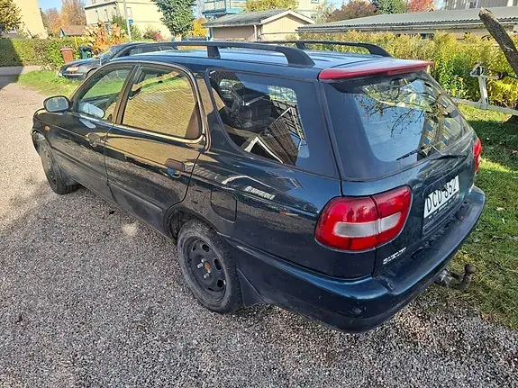 Suzuki Baleno 1997 photo 2