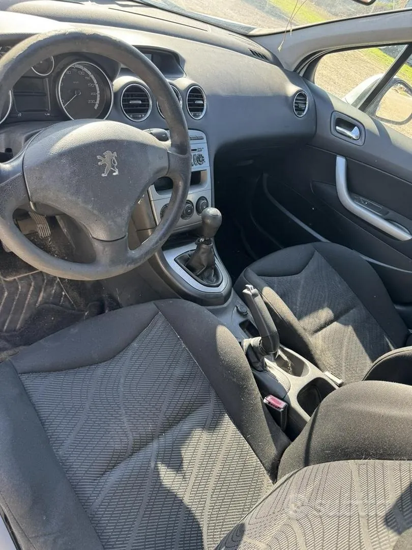 Peugeot 308 2009 photo 3