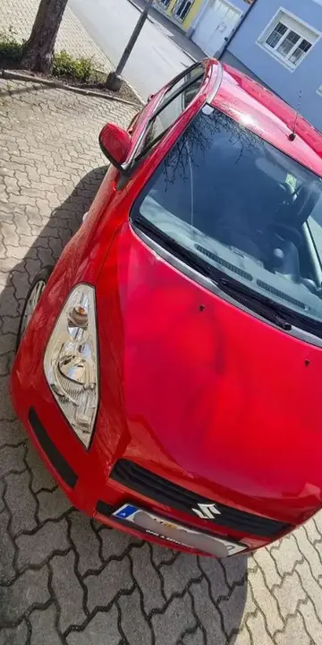 Suzuki Splash 2011 photo 2