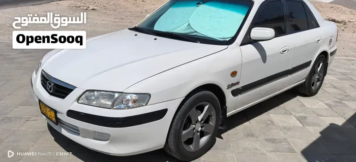 Mazda 626 1999 photo 4