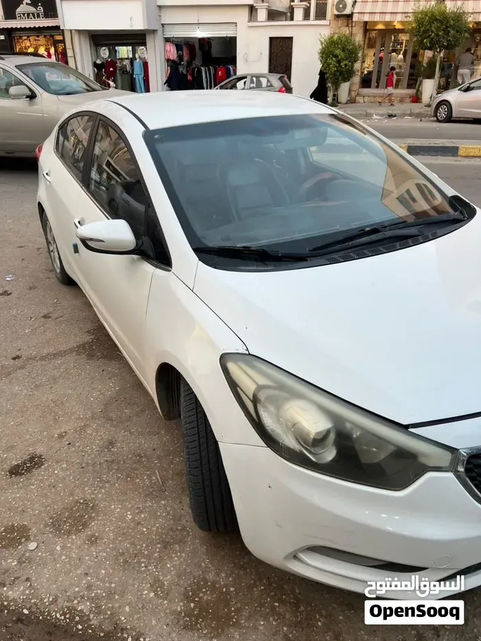Kia K3 2014 photo 2