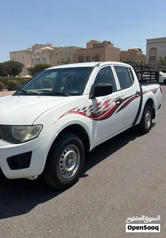 Mitsubishi L200 2013 photo 5