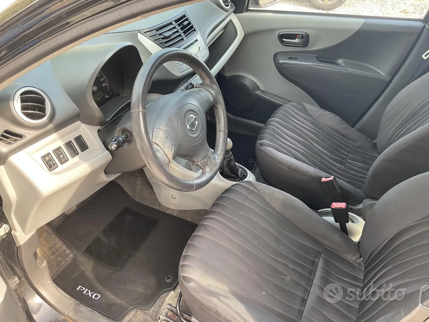 Nissan Pixo 2010 photo 5