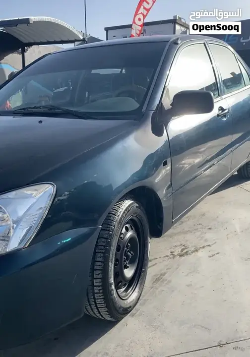 Mitsubishi L200 2006 photo 4