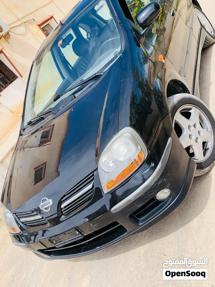 Nissan Almera 2004 photo 3