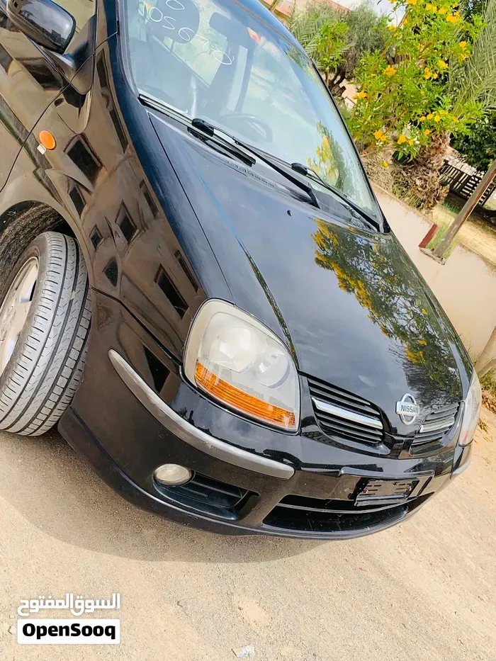 Nissan Almera 2004 photo 4