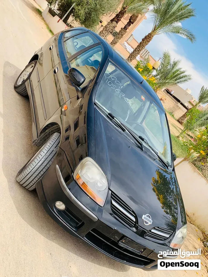 Nissan Almera 2004 photo 2